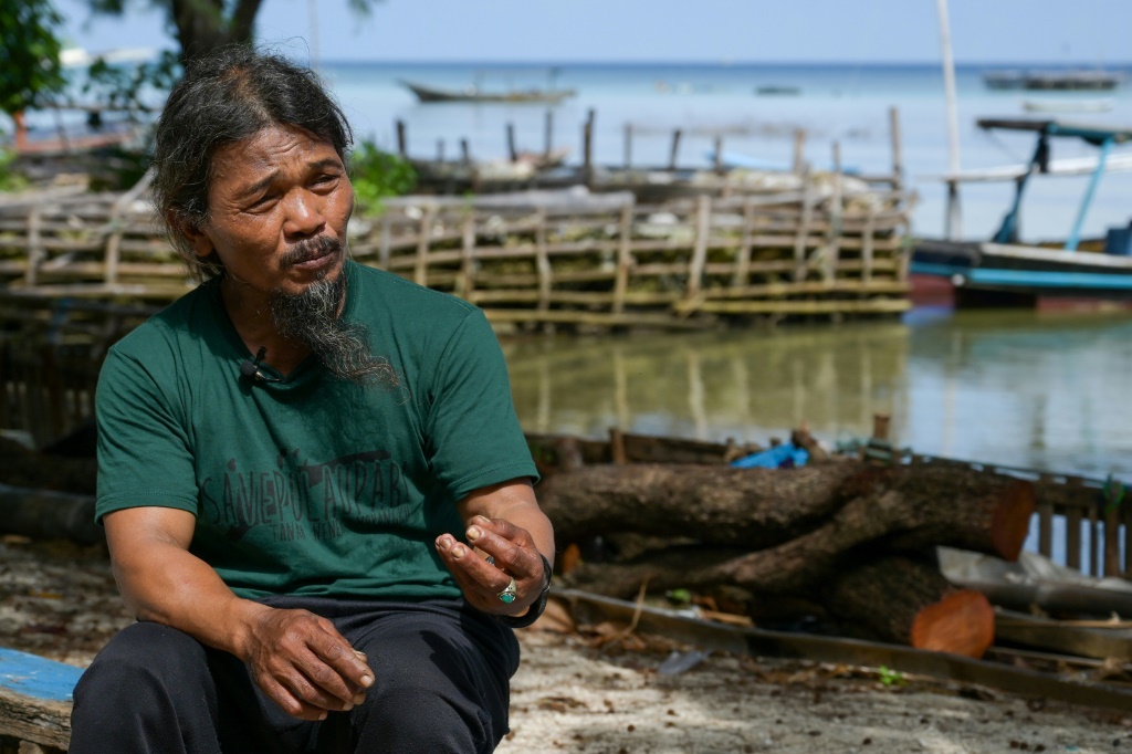Mustagfirin is one of four Pari residents calling for Holcim to reduce its emissions