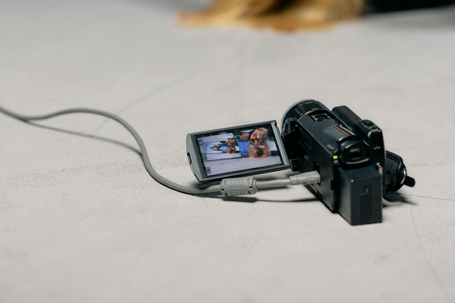 A photo of a video camera on the floor