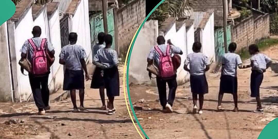Boy criticised for carrying female classmates' bags