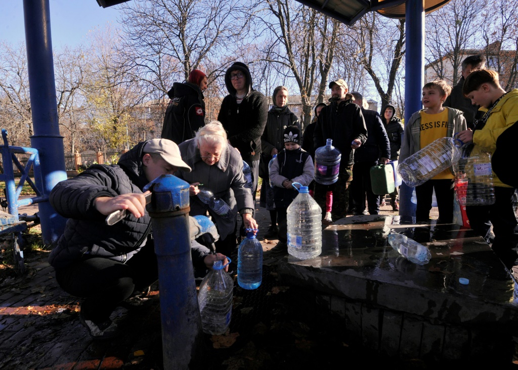 Kyiv residents filled up on water at a park in the Ukrainian capital on Monday