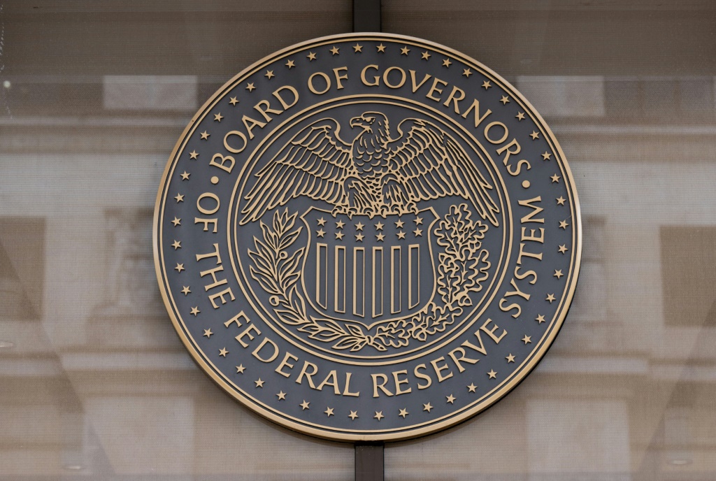 US Fed officials agreed to keep monetary policy tight 'for some time'