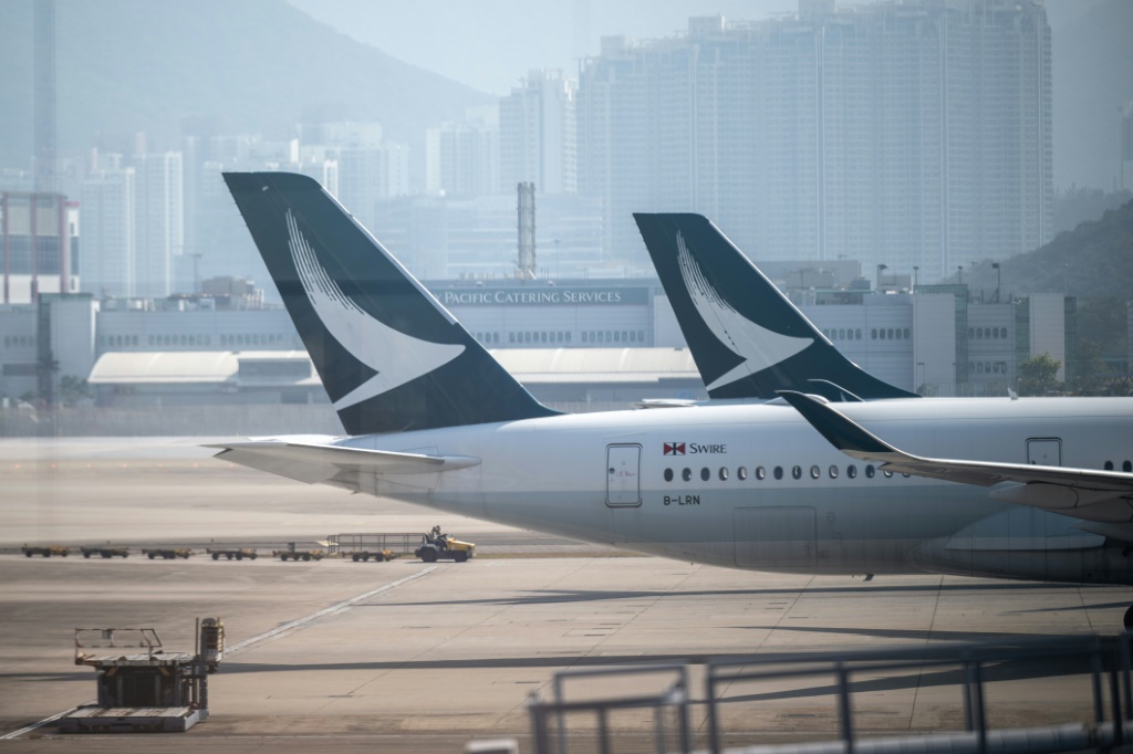 Hong Kong carrier Cathay Pacific on Wednesday reported profits in the first half as travel demand grows