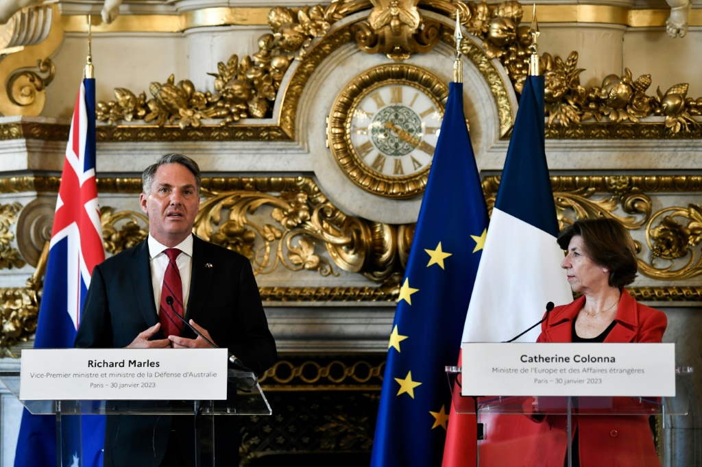 Australian Defence Minister Richard Marles speaks next to French Foreign Minister Catherine Colonna