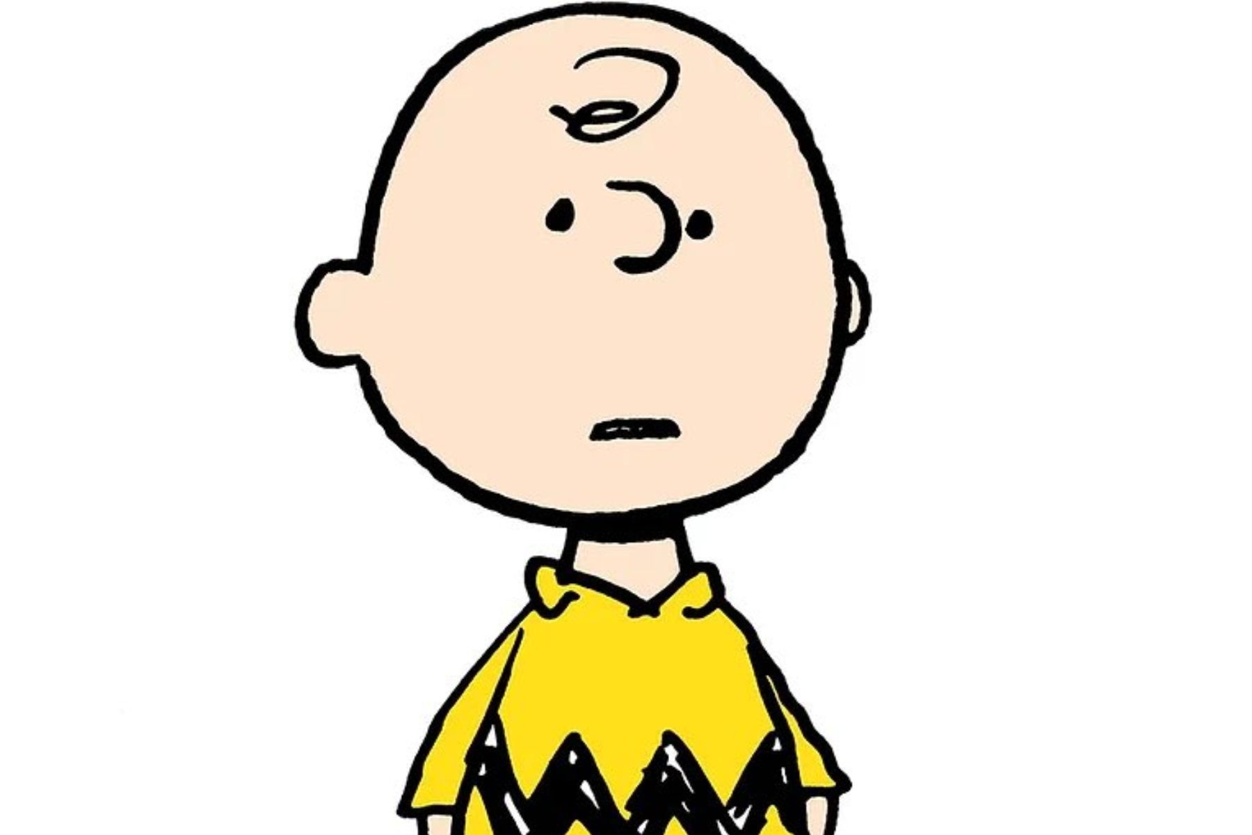 Charlie Brown stands against a white background