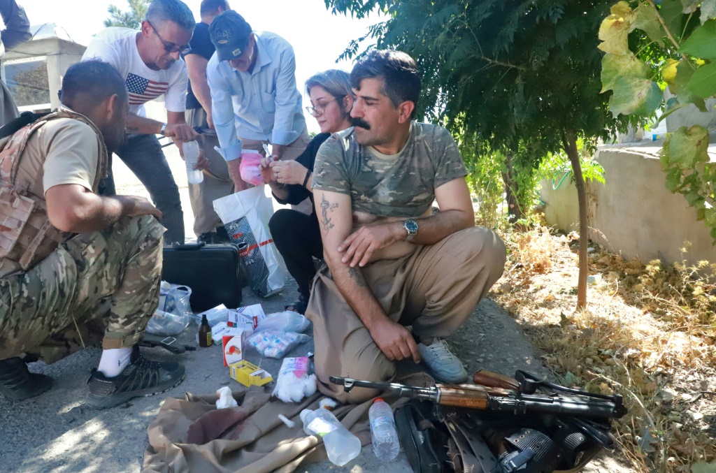 An injured member of the Iranian Kurdish nationalist group Komala receives treatment, after Iranian cross-border strikes in Iraq