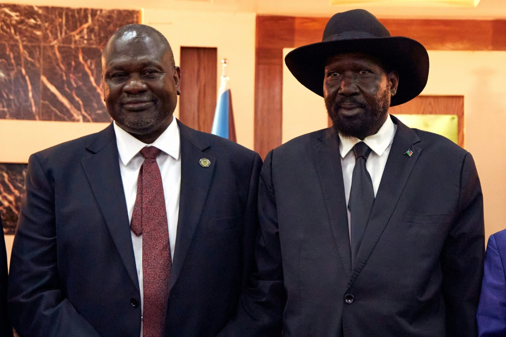 Kiir (R) and Machar (L) formed a unity government more than two years ago after half a decade of fighting
