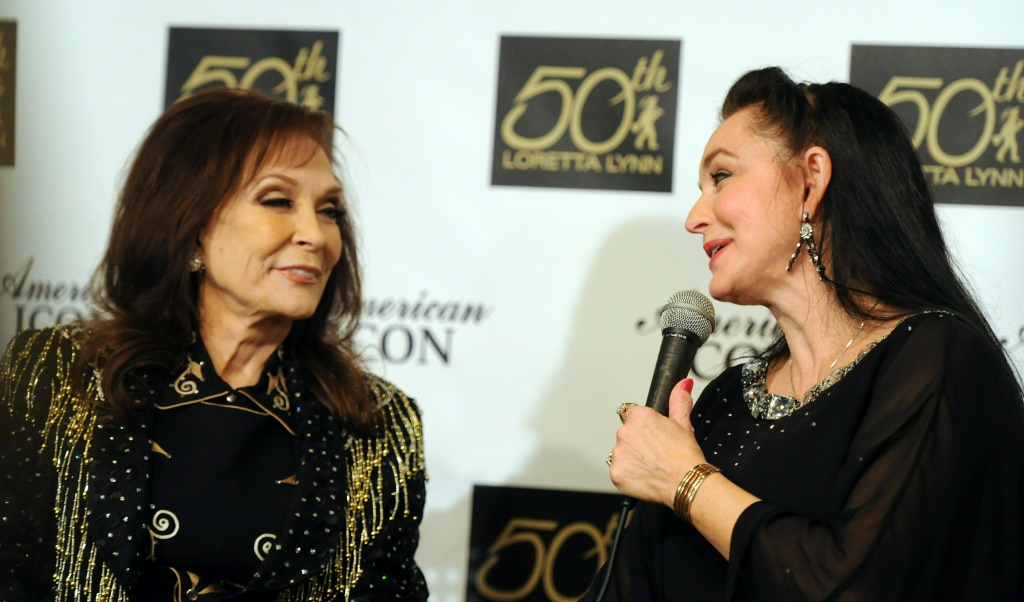 Loretta Lynn (L) is seen here with younger sister and fellow singer Crystal Gayle in 2010