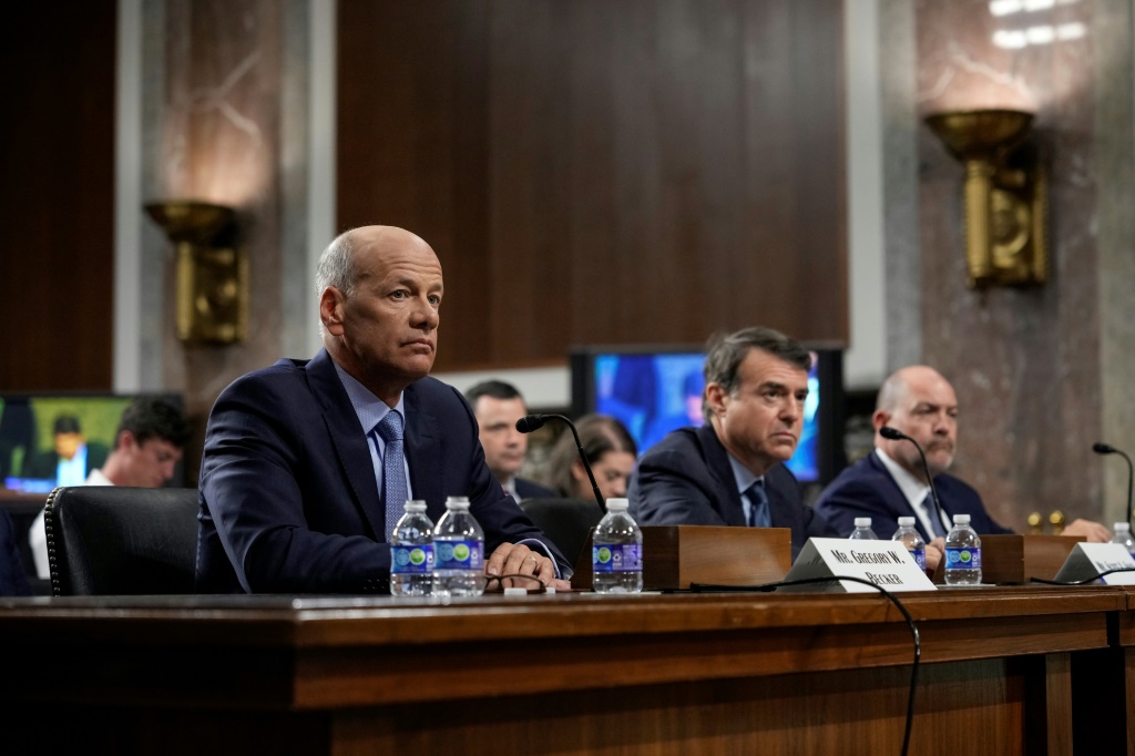 (L-R) Former CEO of Silicon Valley Bank Gregory Becker, former chairman of Signature Bank Scott Shay and former president of Signature Bank Eric Howell testify during a Senate Banking Committee hearing on May 16, 2023, in Washington