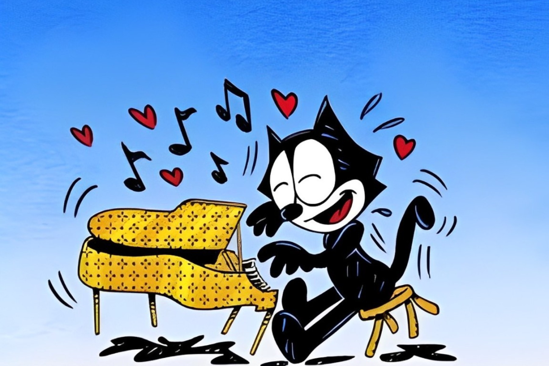 Felix the Cat is playing keyboard