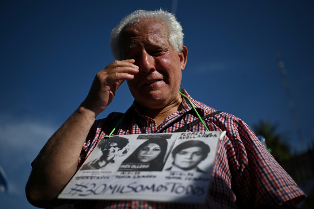 A man cries at the Plaza de Mayo in Argentina during a ceremony for Hebe de Bonafini on November 24, 2022