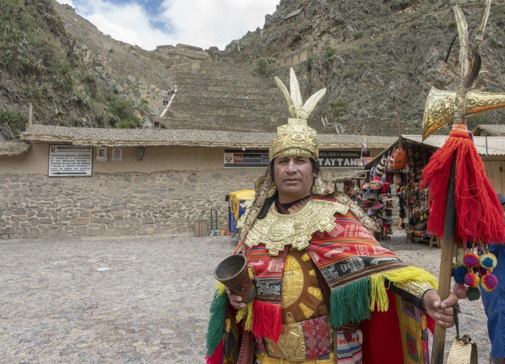Juan Pablos Huanacchini waits at the entrance to the Inca ruins in Ollantaytambo where tourism has virtually ground to a halt