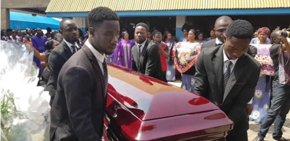 A casket being carried
