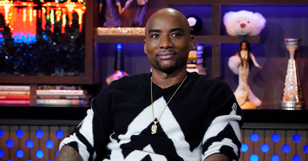 Charlamagne Tha God seated in a chair