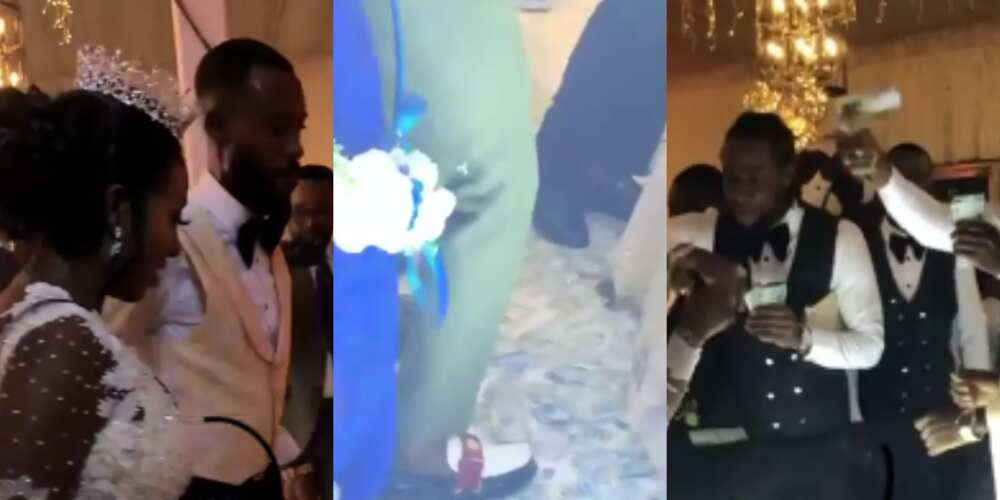 Money rains: 'Big boys' spray cash on beautiful couple at their lavish wedding reception (Video)