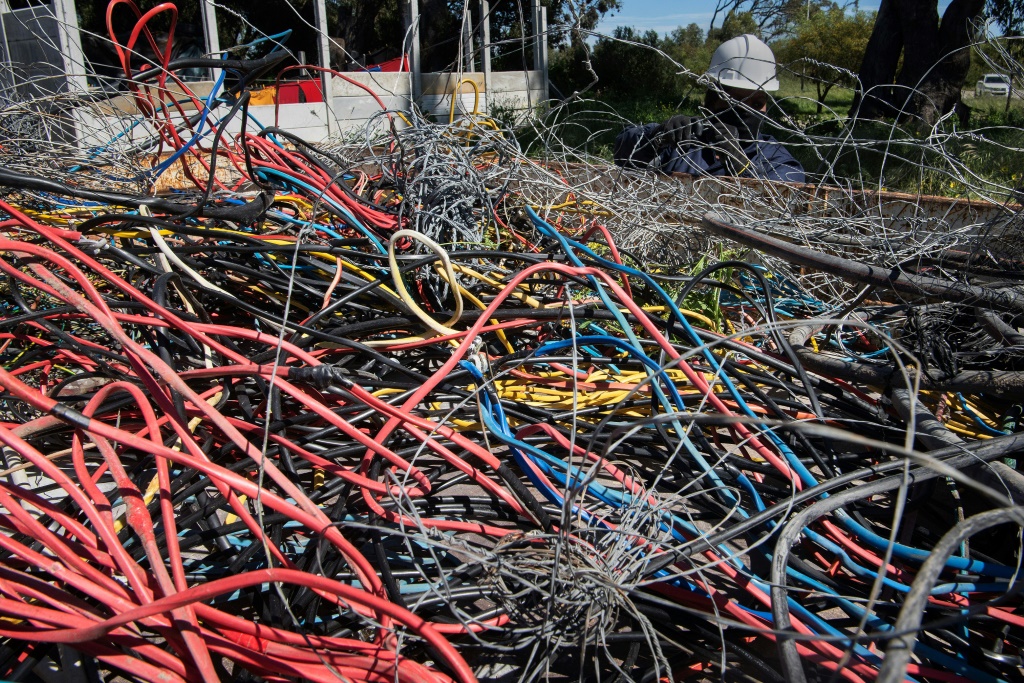 Kilometres of electricity cables were confiscated at the informal settlement