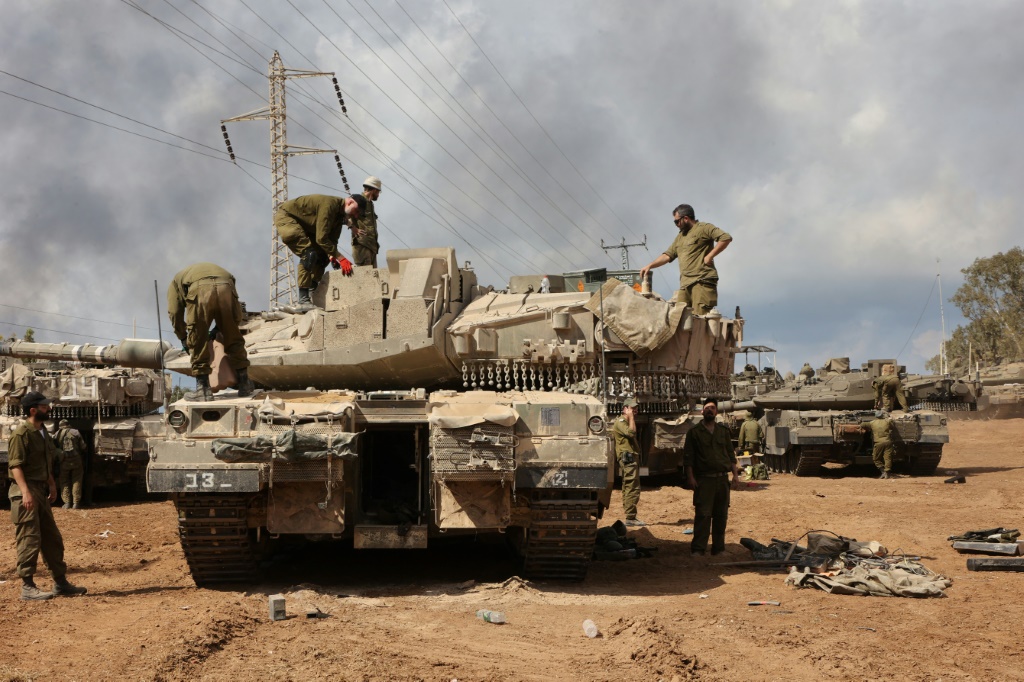 After a week of bombing in Gaza, Israel has build up a huge force on the territory's border ahead of an expected ground invasion