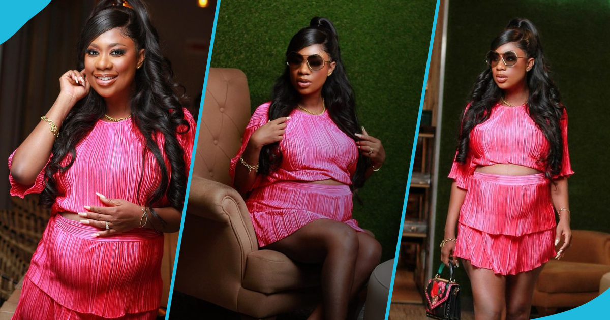 Selly Galley in a pink crop top and mini skirt