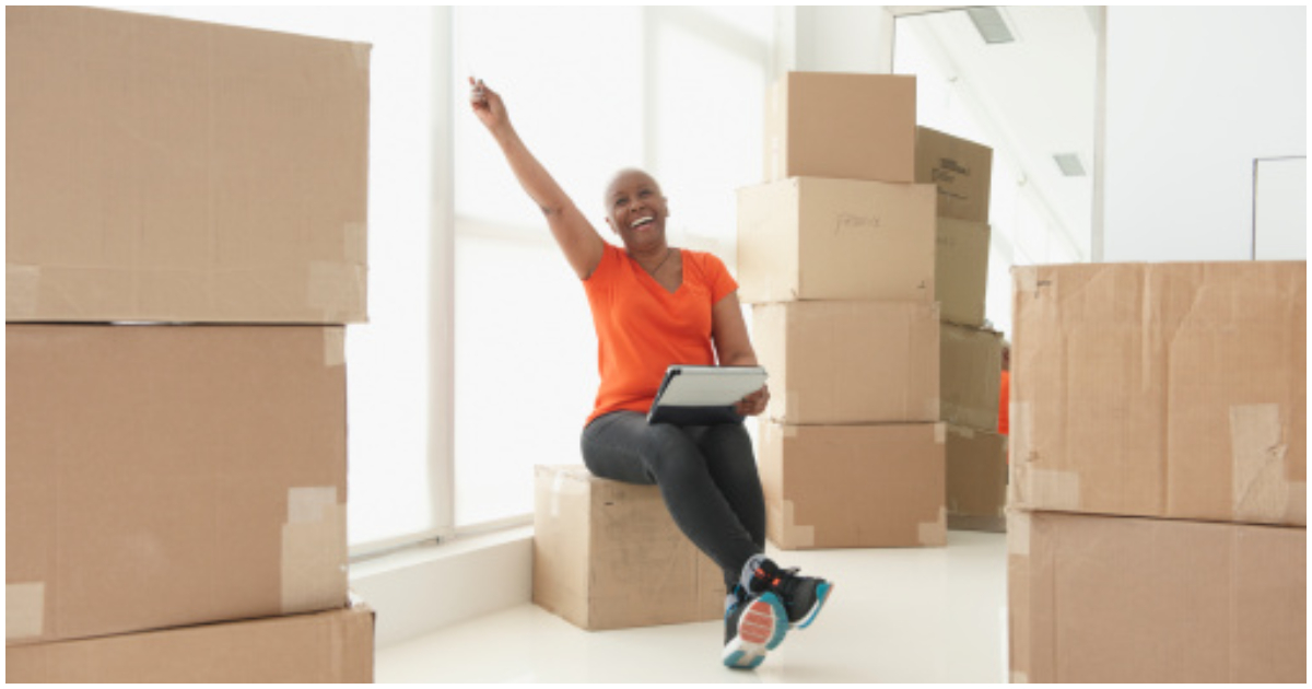 A lady shows excitement about moving into her new home