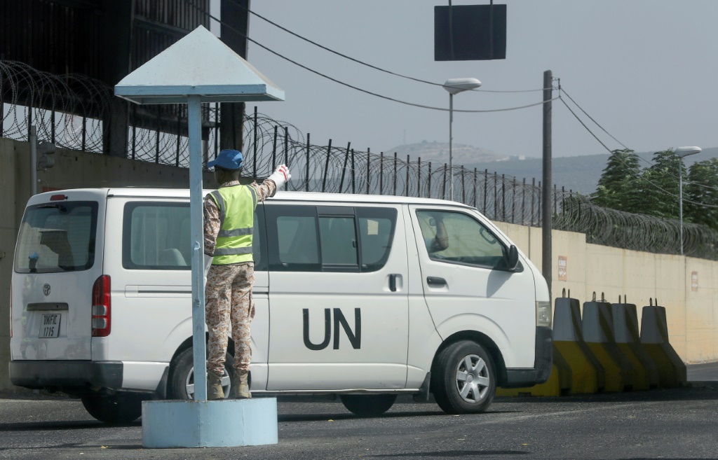 A United Nations peacekeeping force (UNIFIL) vehicle drives in Naqura, the southernmost Lebanese town by the border with Israel