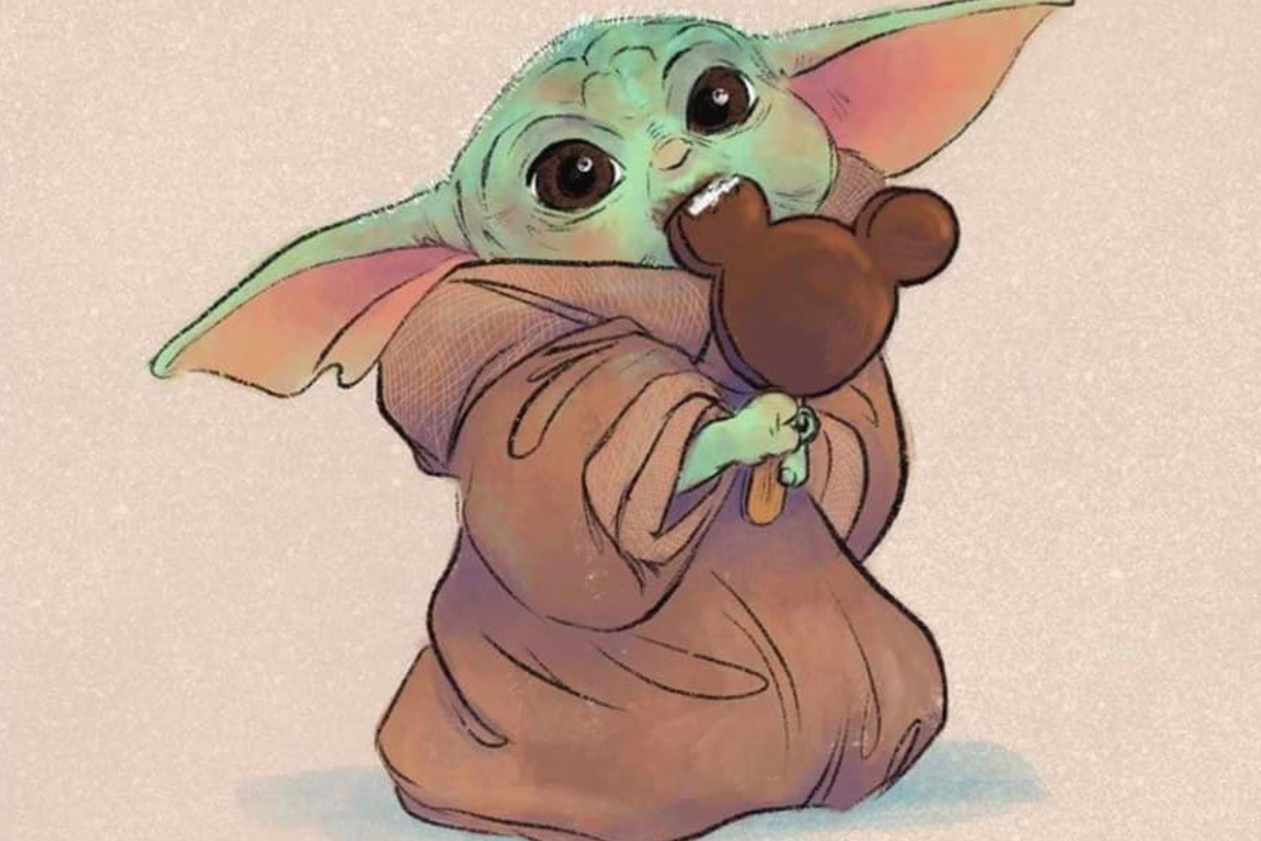 Baby Yoda is eating a brown candy