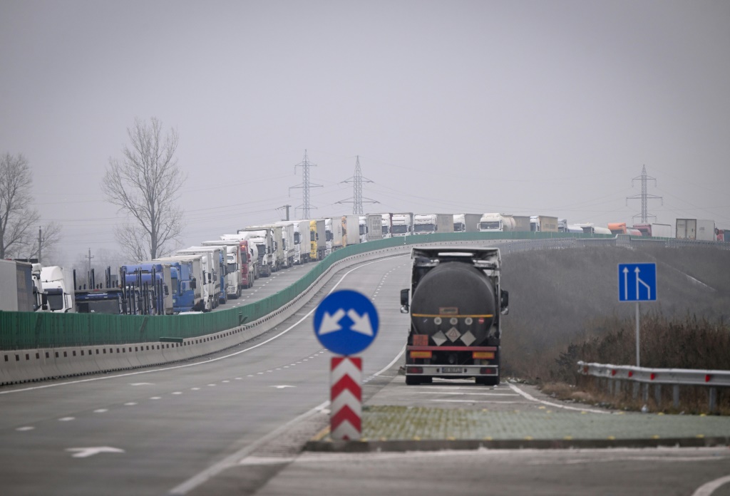 At Giurgiu, on the Romanian-Bulgarian border, a queue of trucks several kilometres begins forming from dawn