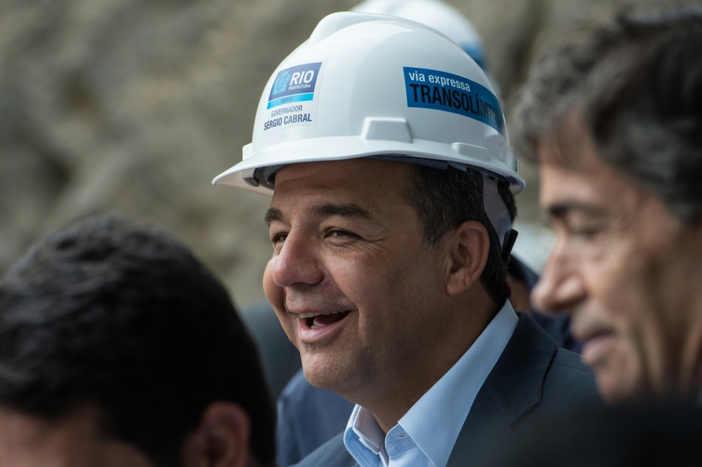 Sergio Cabral, then governor of Rio de Janeiro, smiles during a visit to a Brazilian construction site on November 8, 2013; he is expected to be freed soon from prison after serving six years on massive corruption charges