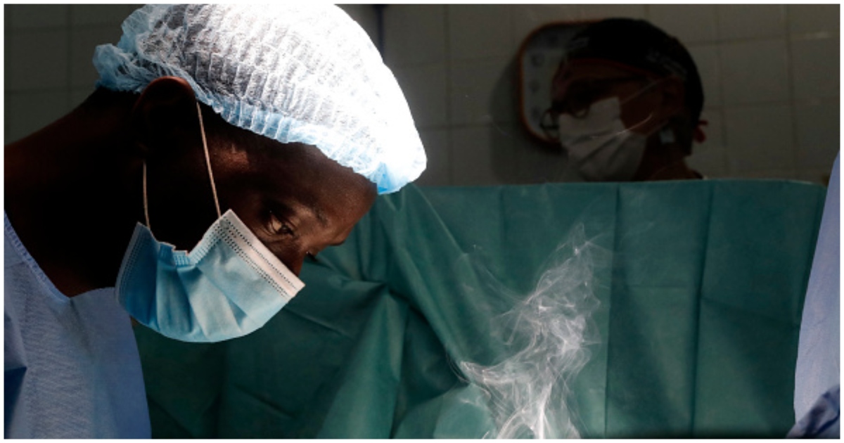 An African doctor conducts pediatric surgery at a hospital. Source: Getty Images.
