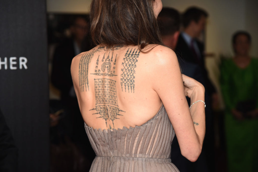 Angelina Jolie, tattoo detail as she attends the "First They Killed My Father" New York premiere in New York City.