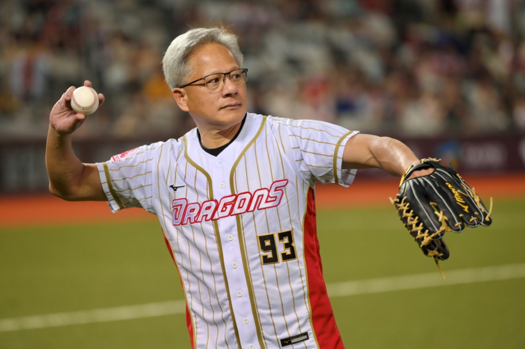 Nvidia CEO Jensen Huang throws out the opening pitch before a baseball game at the Taipei Dome
