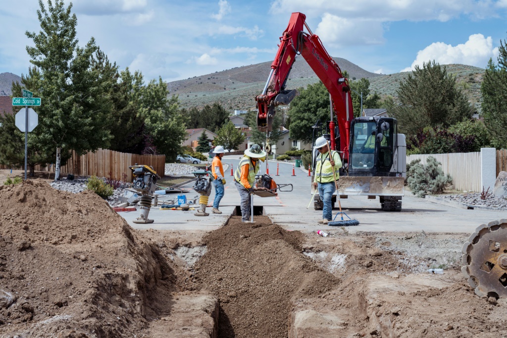 Heavy machinery is used to construct 42 new home units in Cold Springs, Nevada in June 2023