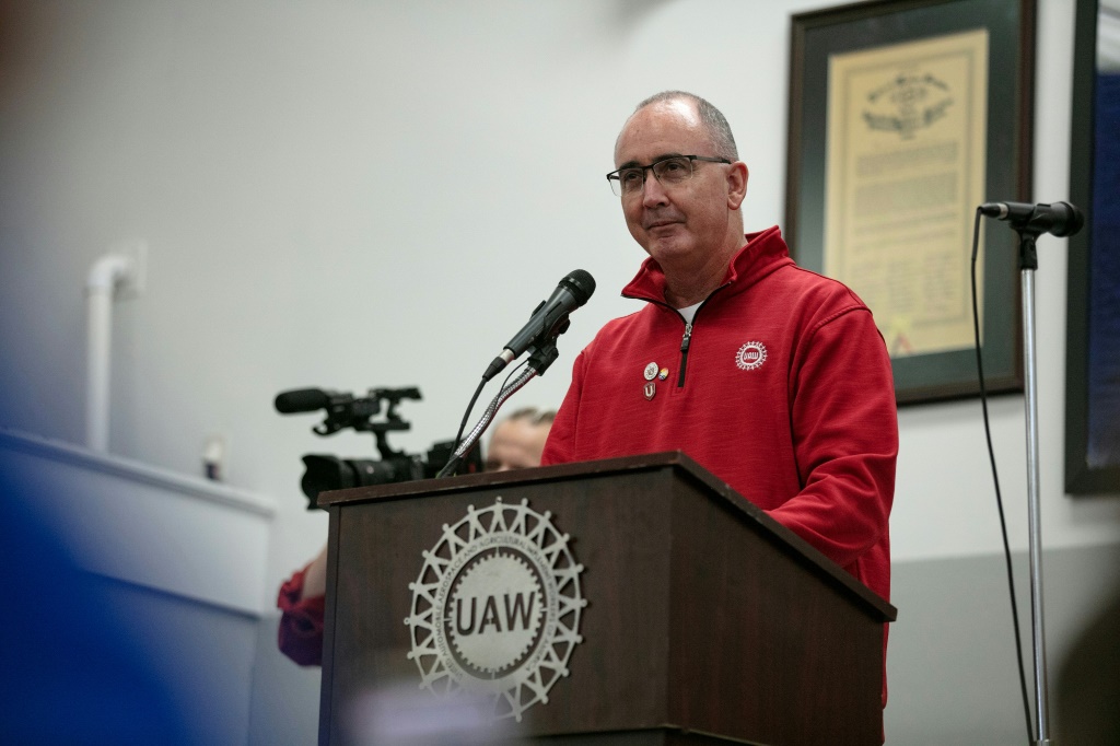UAW President Shawn Fain, shown at a rally last weekend in Chicago, warned the union could launch more last-minute strikes on Detroit's 'Big Three'