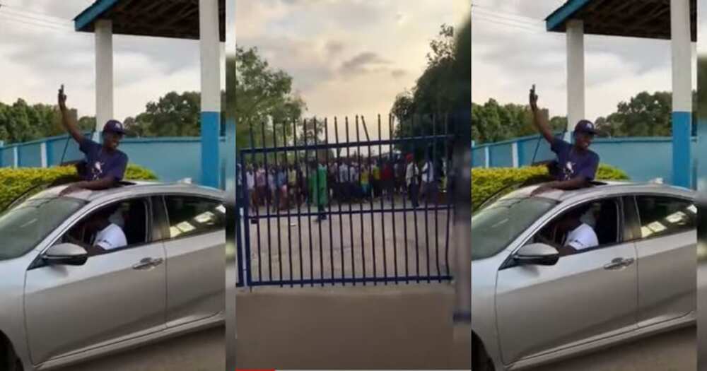 Yaw Tog goes to school in Open top car; students flow him 'fans'