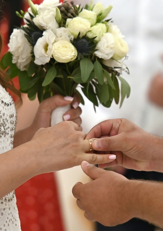 In the five months since Russia's invasion, 9,120 marriages have been registered in Ukraine's capital, compared to the 1,110 registered during the same period last year