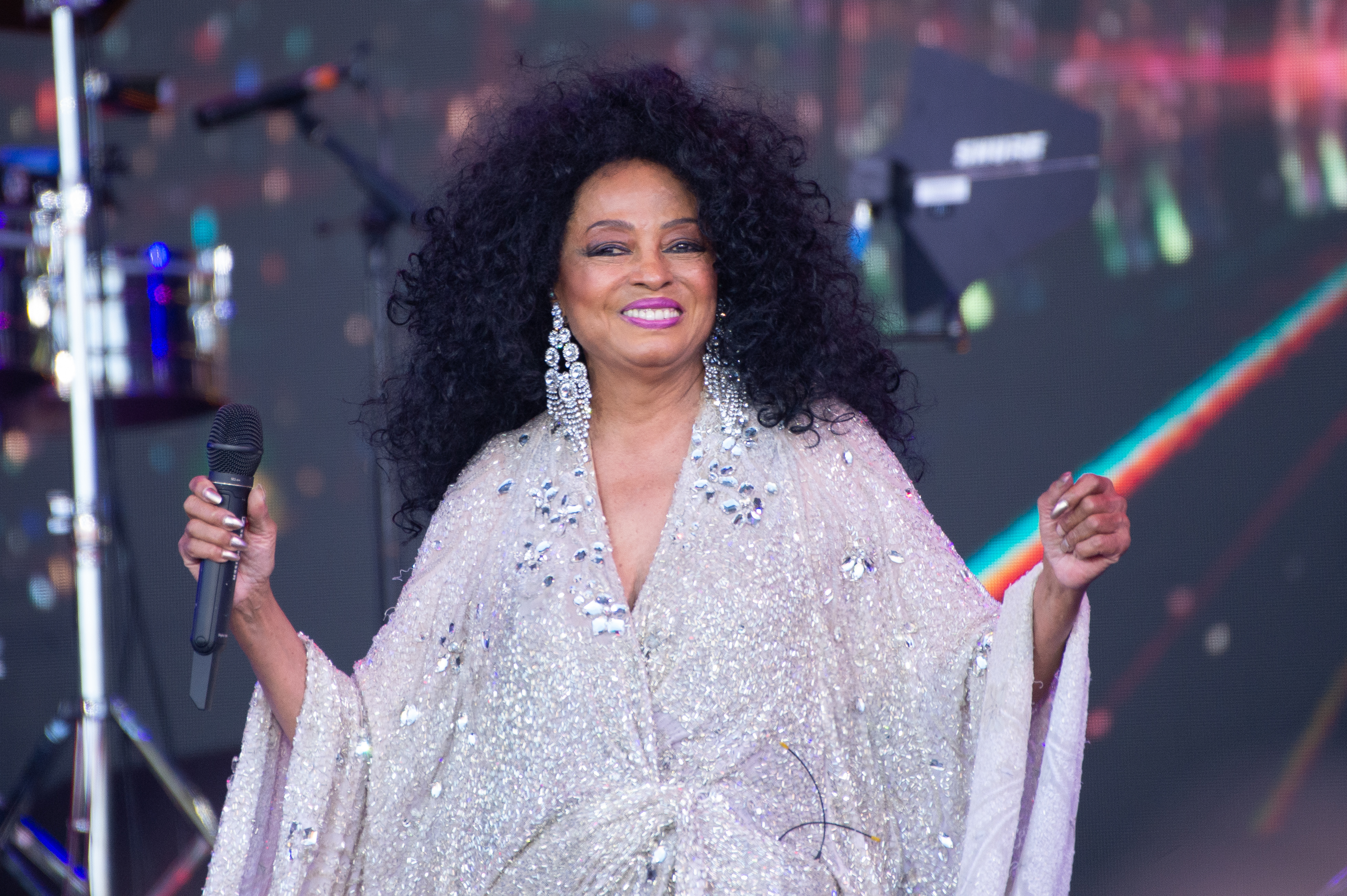 Diana Ross is performing on stage in Glastonbury, England