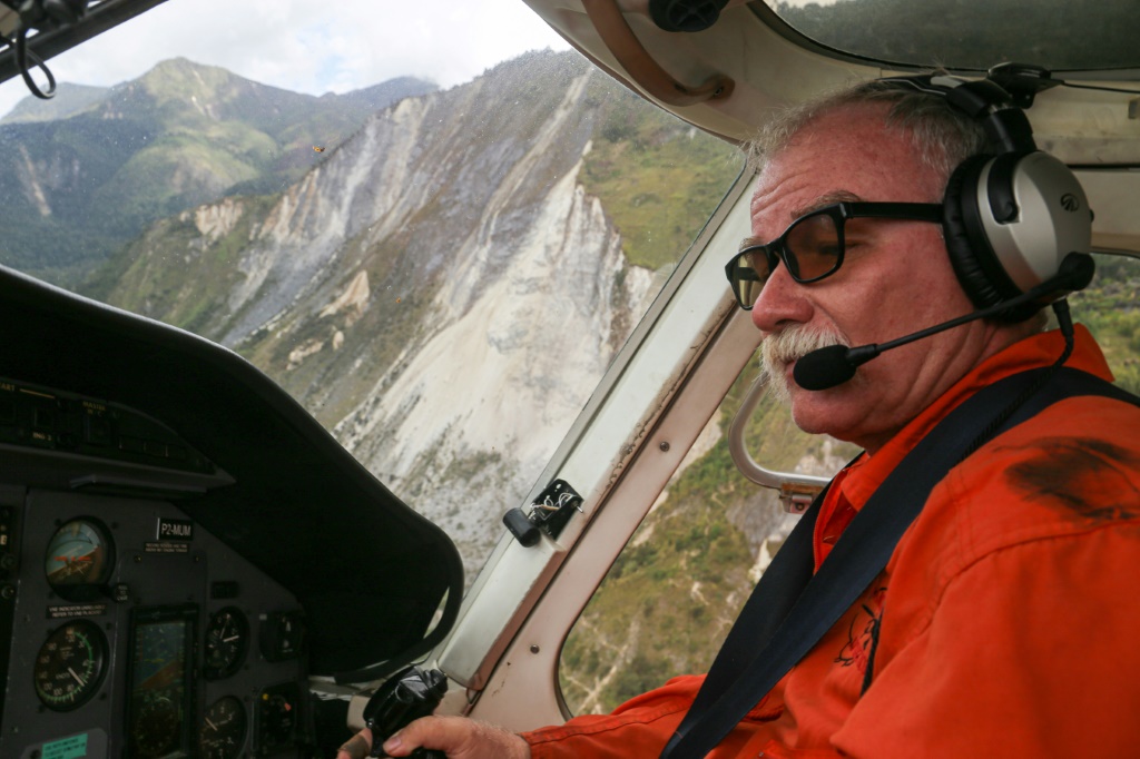 Manolos Aviation owner Jurgen Ruh told AFP pilots working for him saw the side of a mountain 'disappear' while airlifting a pregnant woman from a rural area