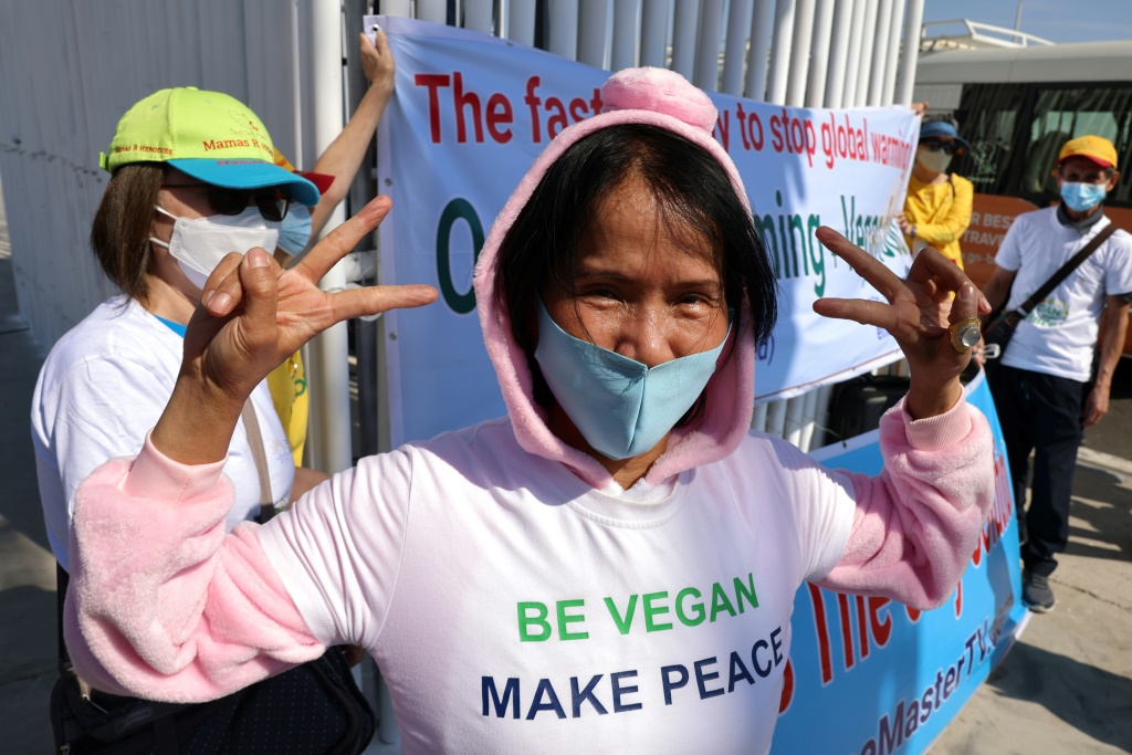 Vegan activists demonstrate on the first day of the 27th United Nations Climate Change Conference, held in the Egyptian Red Sea resort of Sharm el-Sheikh