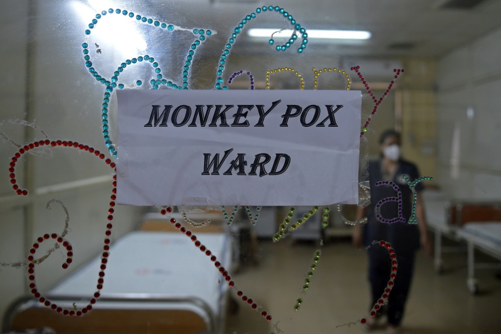A health worker walks inside an isolation ward built as a precautionary measure for monkeypox patients at a civil hospital in Ahmedabad, India