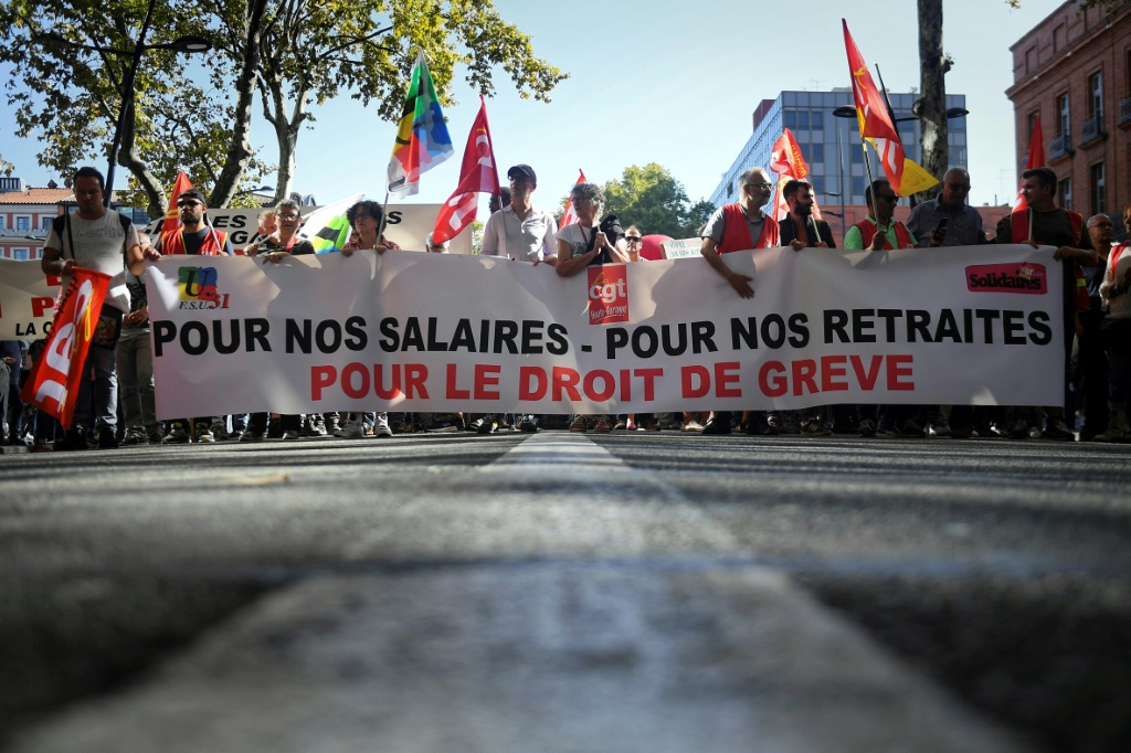 Most French people oppose the government's pension plans, polls say