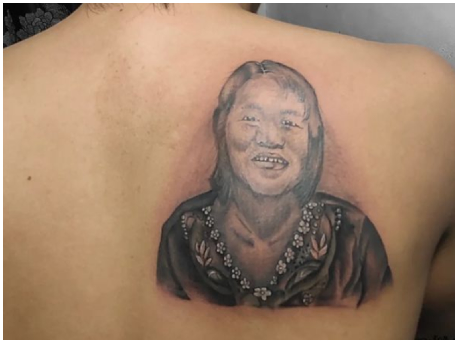 Back tattoo for women