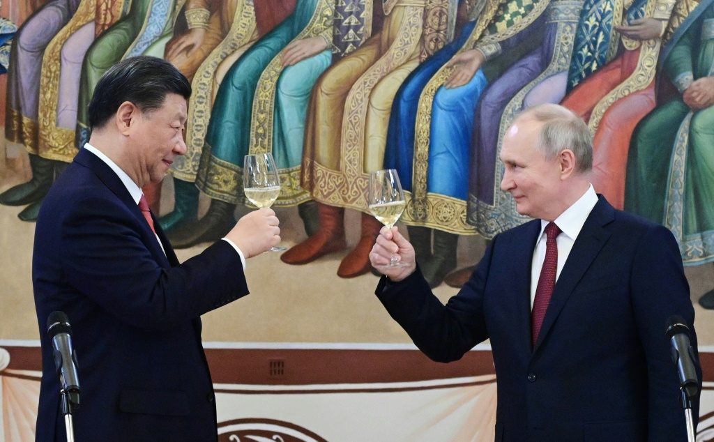 The talks were heavy on pomp and ceremony as Putin and Xi hailed a 'new era' in the relationship between their countries