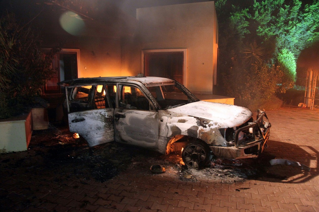 A vehicle and  buildings of the US consulate compound in Benghazi, Libya, after the 2012 attack by Ansar al-Sharia