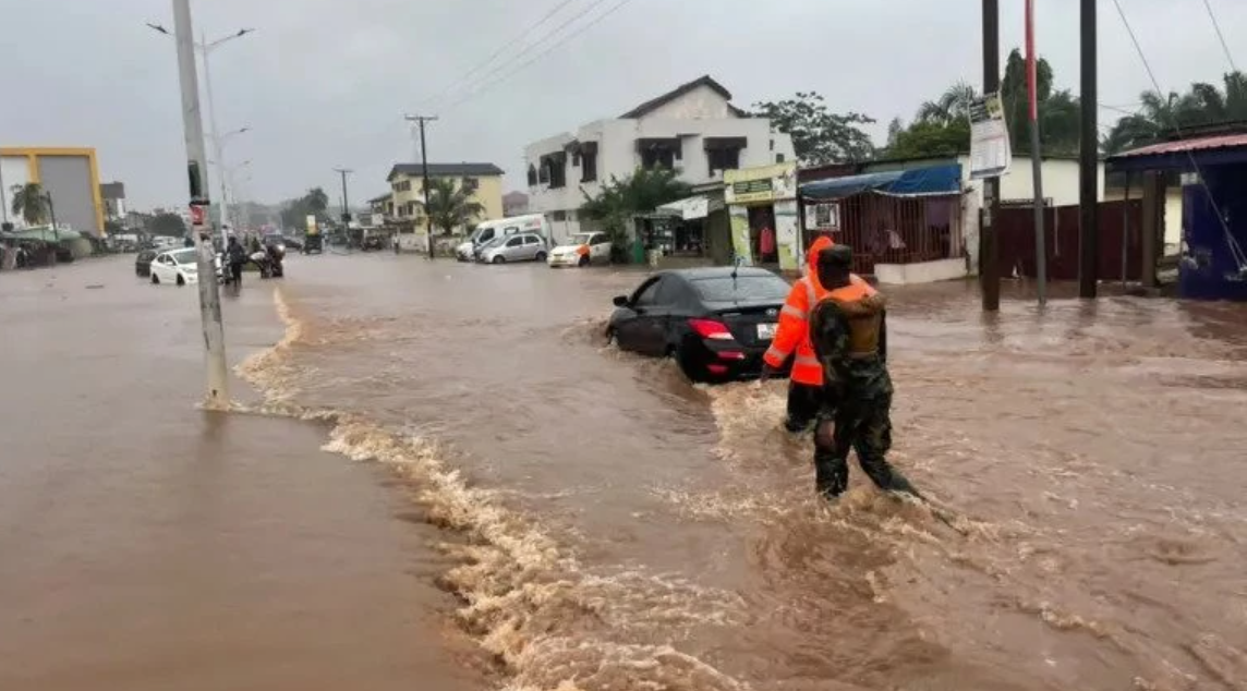 Ghanaian soldiers rescue lives after Accra rains on Wednesday.