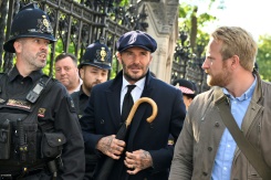Former England footballer David Beckham joined the public in huge queues waiting to see the queen lying in state