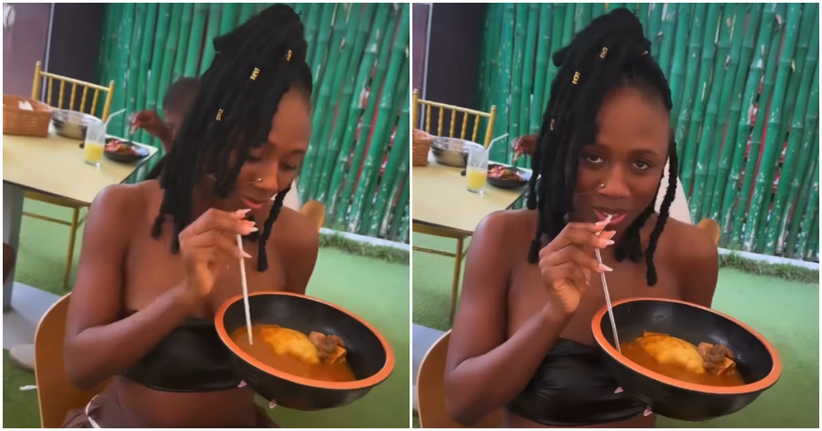 Korra Obidi sips soup and 'fufu' with a straw.