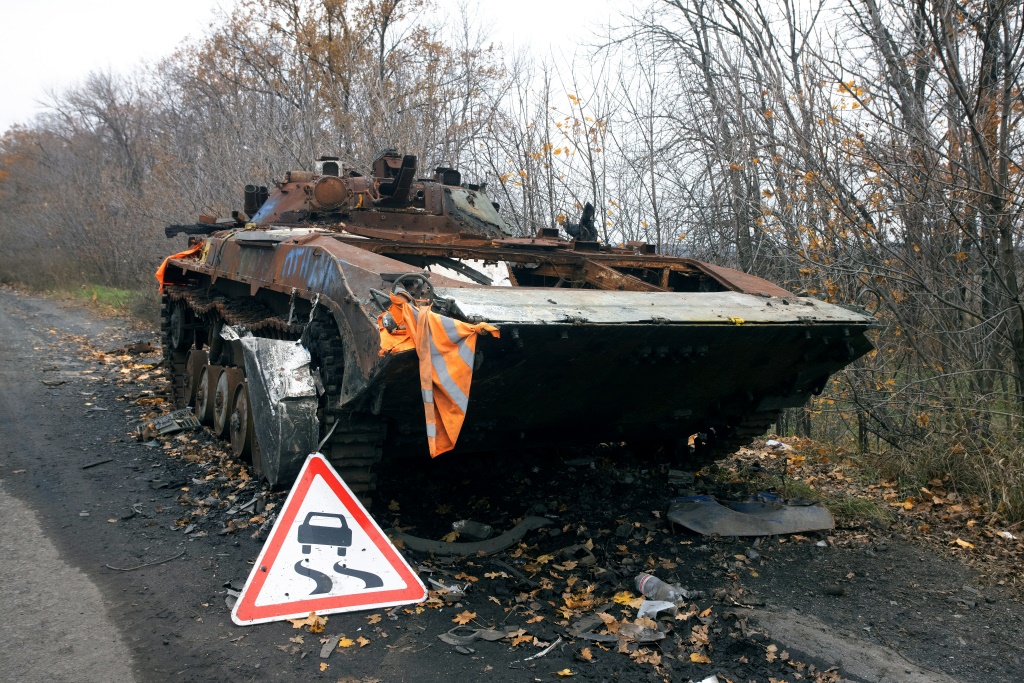 A damaged Russian armoured personnel carrier on a road in Ukraine's Kharkiv region on November 1
