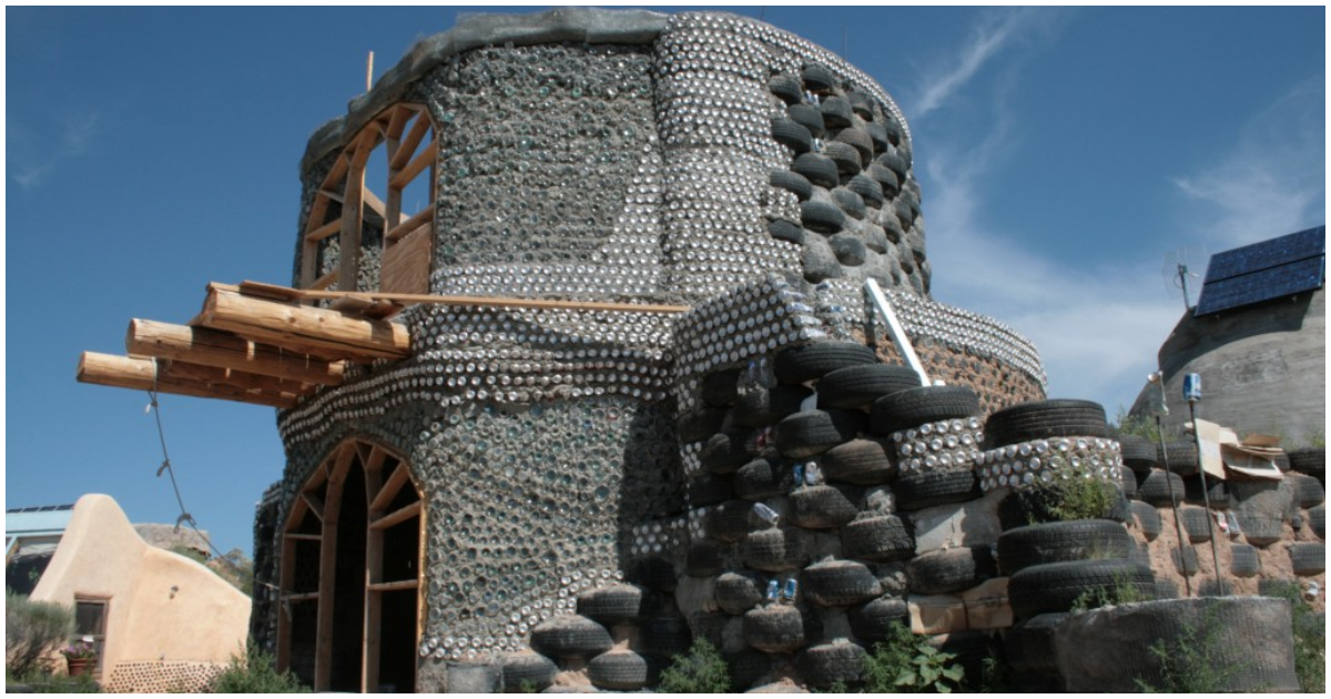 House is made out of tyres, wood and earth