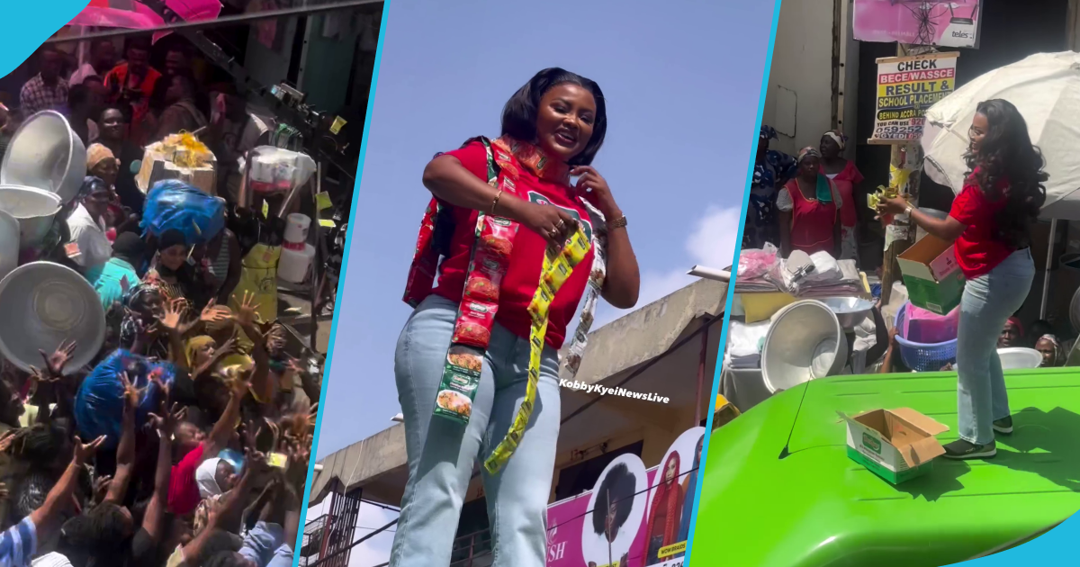 Nana Ama McBrown throws free Deedew Spices on Makola Market women while standing on the top of a bus