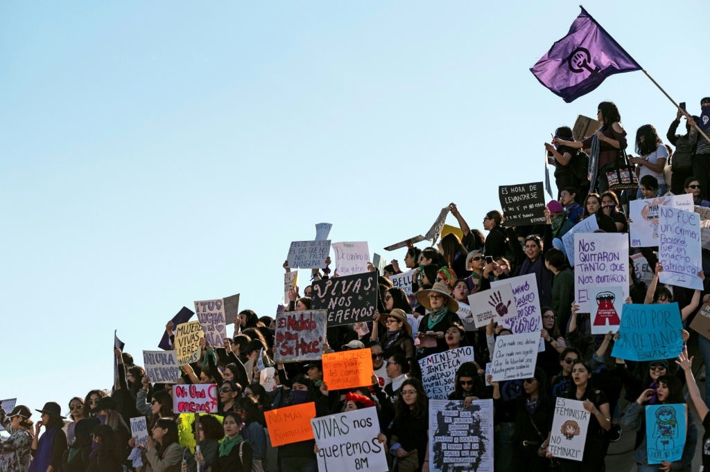 Women attend an International Women's Day demonstration in March 2020 in the Mexican border city of Tijuana, where activists are helping American women seeking abortions