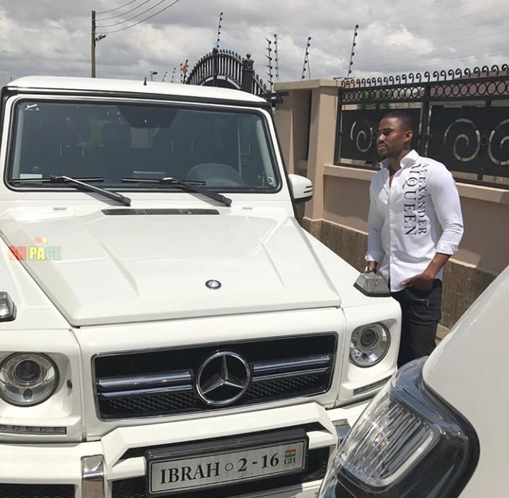 Ibrah and one of his many cars