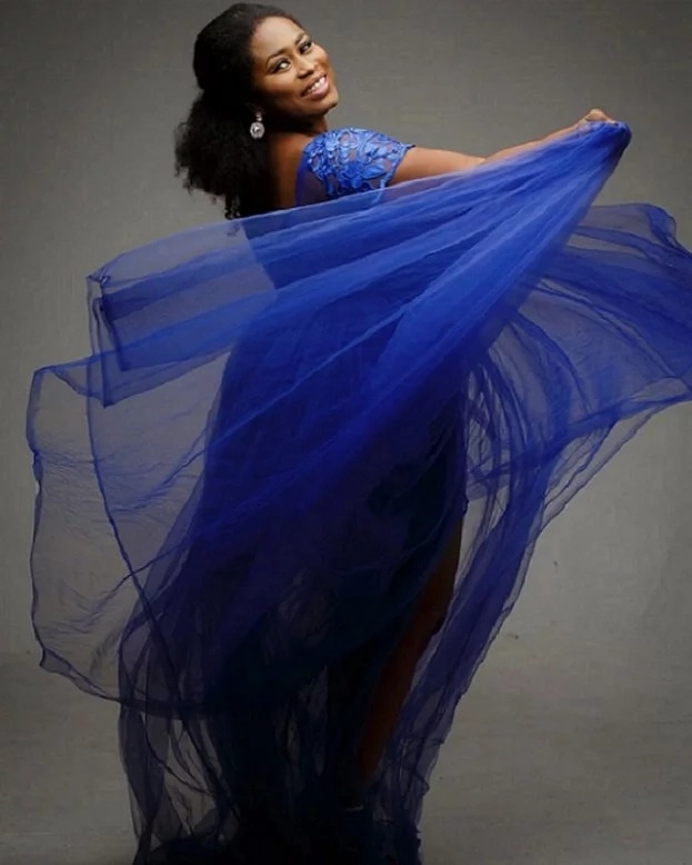 Lydia Forson twirls her blue dress